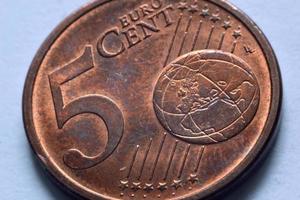 Close up of a five euro cent coin. 5 euro cent coin.Five euro cents in an extreme close up shot.
