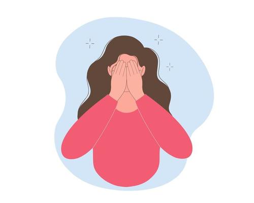 Young woman hides her face in her hands. Concept of fear, shame, social phobia.