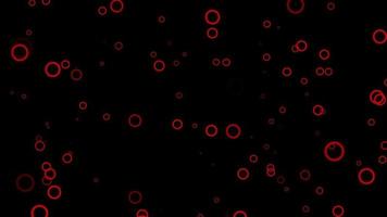 Red circle particle motion background. Faded wallpaper animation with black color. Flying bubble. video