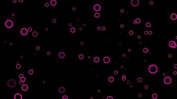 fundo de movimento de partículas de círculo rosa. animação de papel de parede desbotada com cor preta. bolha voadora.