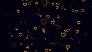 Orange heart particle motion background. Faded wallpaper animation with black color. Flying bubble. video