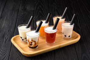 Taiwan milk tea with bubble on wood background photo