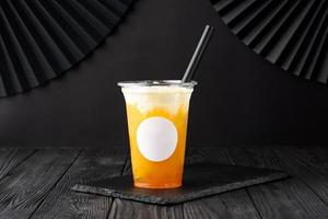 Taiwan milk tea with bubble and mango on wooden background photo