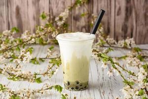 Taiwan milk tea with bubble on wood background photo