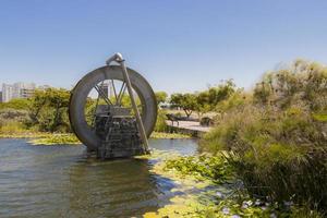 Watermill in lake pond in Green Point Park Cape Town. photo