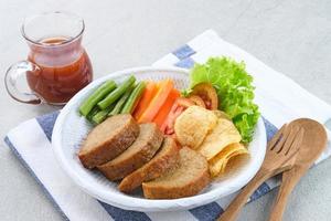 Selat solo galantin is a traditional Javanese dish that has European influences and originates from Solo, Central Java. Consisting of meat and vegetables. photo