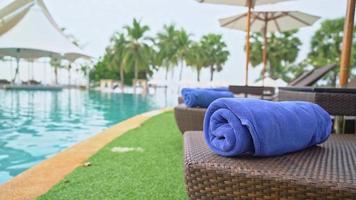 towel on beach chair - travel and vacation concept