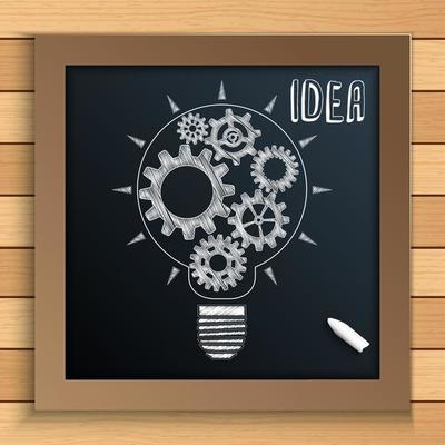 Bulb mechanism with cogs and gears written by chalk on blackboard