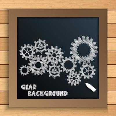 Cogs and gears mechanism written by chalk on blackboard