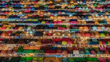Secuencia de timelapse de 4k de bangkok, tailandia - mercado nocturno de bangkok