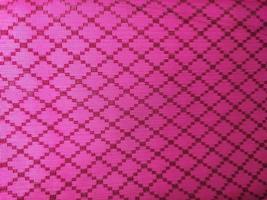 pink fabric texture background with square pattern photo