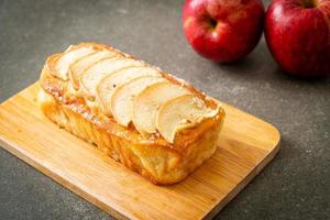 apple loaf crumbled on wood board photo