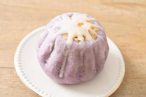 taro bun with white sugar cream and nut photo