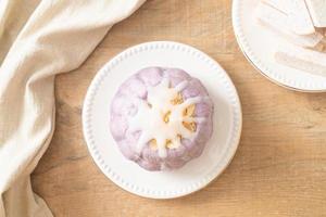 taro bun with white sugar cream and nut photo