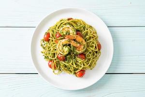 Spaghetti with prawns or shrimps in homemade pesto sauce