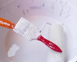 paint brush and white paint