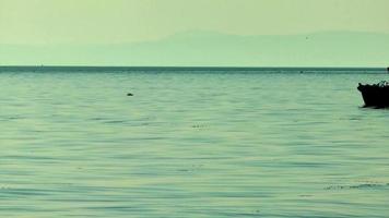 Old Empty Fishing Boat And Sea Waves Footage. video