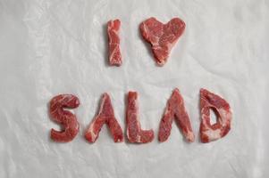 I Love Salad Writing from Fresh raw steak photo