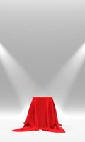 Podium, pedestal or platform covered with red cloth illuminated by spotlights on white background. Abstract illustration of simple geometric shapes. 3D rendering. photo
