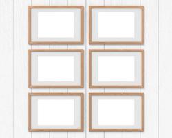 Set of 6 horizontal wooden frames mockup with a border hanging on the wall. Empty base for picture or text. 3D rendering. photo