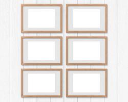 Set of 6 horizontal wooden frames mockup with a border hanging on the wall. Empty base for picture or text. 3D rendering. photo