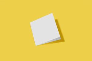 Mockup square booklet, brochure, invitation isolated on a yellow background with hard cover and realistic shadow. 3D rendering. photo