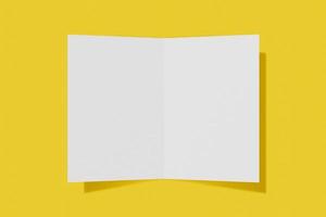 Mockup vertical booklet, brochure, invitation isolated on a yellow background with hard cover and realistic shadow. 3D rendering. photo