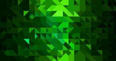 triángulo de forma de mosaico verde abstracto patrón de degradado brillante poligonal realista en la oscuridad. foto