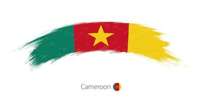 Flag of Cameroon in rounded grunge brush stroke. vector