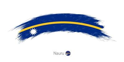 Flag of Nauru in rounded grunge brush stroke. vector