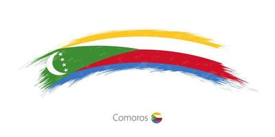 Flag of Comoros in rounded grunge brush stroke. vector