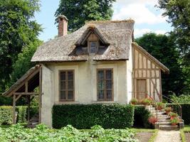 Old abandoned cottage in a public park in Paris, France photo