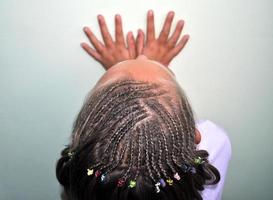 A girl with twisted dread locks hairs photo