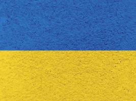 Blue and yellow color old concrete texture. Ukrainian flag simple background. Stock photo