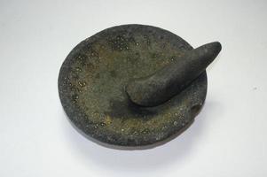 Cobek or Ulekan is a pair of tools that have been used since ancient times to pound, grind, pulverize, grind, and mix certain ingredients. photo