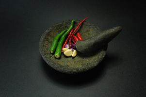 Cobek or Ulekan is a pair of tools that have been used since ancient times to pound, grind, pulverize, grind, and mix certain ingredients. photo