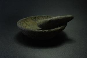 Cobek or Ulekan is a pair of tools that have been used since ancient times to pound, grind, pulverize, grind, and mix certain ingredients. photo