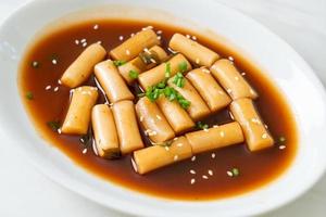 Spicy Jjajang Tteokbokki or Korean rice cake in spicy black bean sauce photo