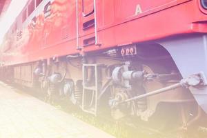 Close - up of red train wheel on the railway.Creative copy paste wallpaper background photo