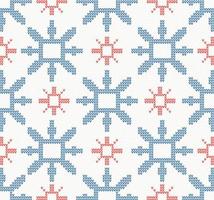 Christmas knitted seamless pattern with blue and red snowflakes. vector