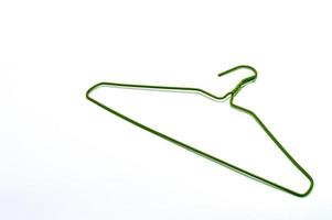 Green hanger object on a white background. photo