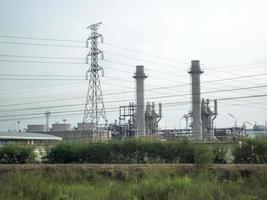 Factory with high voltage towers. photo