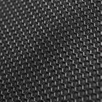 Texture of black leather background with honeycomb shape pattern, macro photo