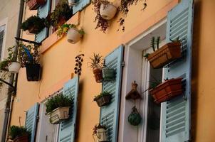 flowerpots on house photo