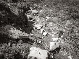 Trekking path to Veslehodn Veslehorn mountain Hydnefossen waterfall Hemsedal Norway. photo