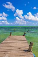 Muyil Lagoon panorama jetty for boat trip turquoise water Mexico. photo