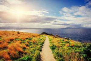 The trail on the hillside by the sea. Lipari island