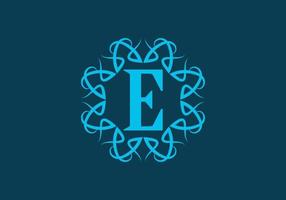 Blue E initial letter in classic frame vector