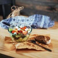 Greek salad with fresh vegetables, feta cheese and olives photo