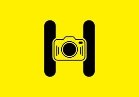 Black yellow of initial H letter with camera vector